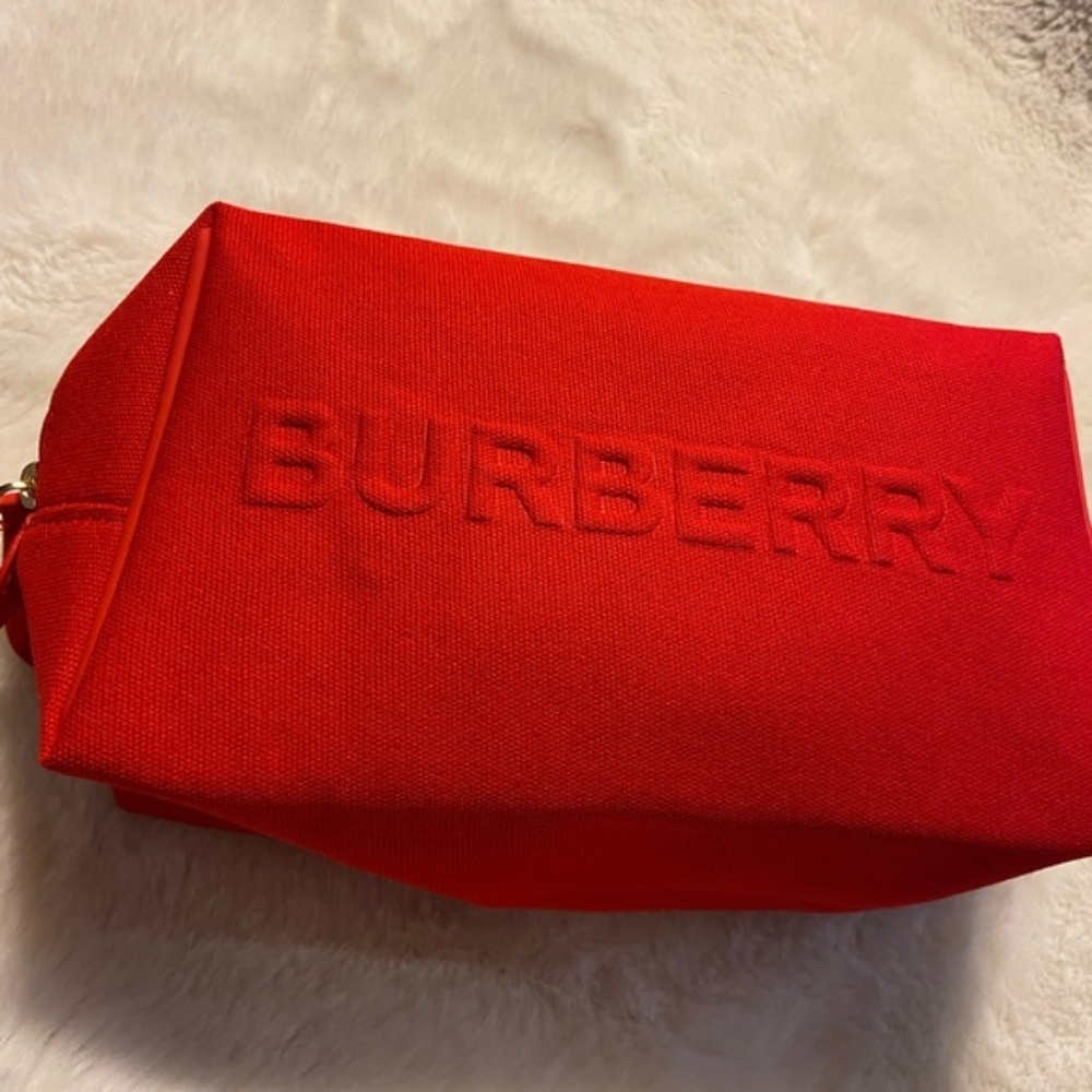 Cherry red Burberry makeup bag